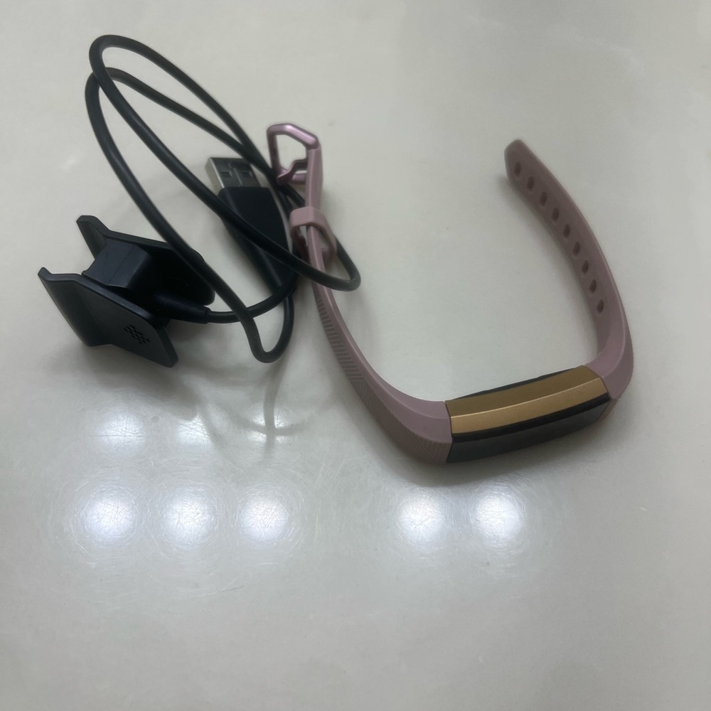 Fitbit Smartwatch in Pink and Gold